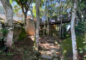 Foto 1 de Casa com 5 Quartos para venda ou aluguel, 1004m² em Cacupé, Florianópolis