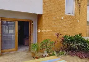 Foto 1 de Casa com 3 Quartos à venda, 140m² em Ibiraquera, Imbituba