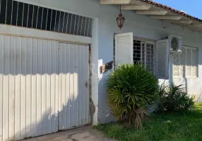 Foto 1 de Casa com 4 Quartos à venda, 181m² em Cavalhada, Porto Alegre