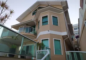 Foto 1 de Casa de Condomínio com 4 Quartos à venda, 330m² em Lagoa, Macaé