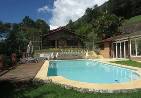 Foto 1 de Casa de Condomínio com 5 Quartos à venda, 350m² em Nogueira, Petrópolis