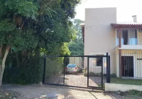 Foto 1 de Casa com 4 Quartos à venda, 160m² em Guarujá, Porto Alegre