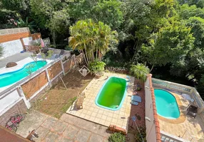 Foto 1 de Casa de Condomínio com 3 Quartos à venda, 320m² em Vila Nova, Porto Alegre