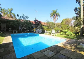 Foto 1 de Casa com 3 Quartos à venda, 429m² em Jardim Isabel, Porto Alegre