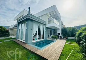 Foto 1 de Casa com 4 Quartos à venda, 245m² em Lagoa da Conceição, Florianópolis