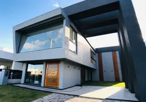 Foto 1 de Casa de Condomínio com 5 Quartos à venda, 248m² em Araca, Capão da Canoa