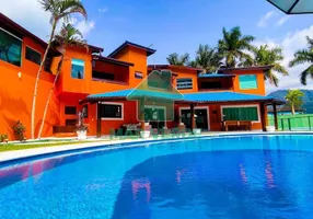 Foto 1 de Casa de Condomínio com 5 Quartos à venda, 550m² em Mar Verde, Caraguatatuba