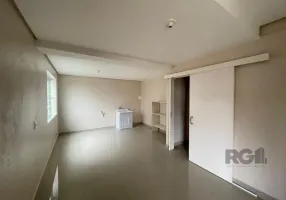 Foto 1 de Casa de Condomínio com 2 Quartos para alugar, 100m² em Vila Nova, Porto Alegre