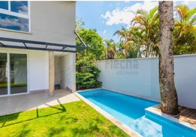 Foto 1 de Casa de Condomínio com 4 Quartos à venda, 425m² em Santo Amaro, São Paulo