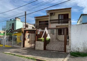 Foto 1 de Sobrado com 4 Quartos à venda, 229m² em São José, Porto Alegre