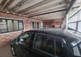 Foto 1 de Casa com 2 Quartos à venda, 180m² em Balneário Maracanã, Praia Grande