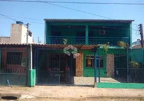 Foto 1 de Casa com 4 Quartos à venda, 125m² em Farrapos, Porto Alegre