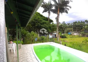 Foto 1 de Casa com 3 Quartos à venda, 90m² em Três Riachos, Biguaçu