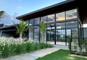 Foto 1 de Casa de Condomínio com 4 Quartos para venda ou aluguel, 550m² em PORTAL DO SOL GREEN, Goiânia
