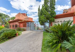 Foto 1 de Casa de Condomínio com 4 Quartos à venda, 357m² em Cristal, Porto Alegre