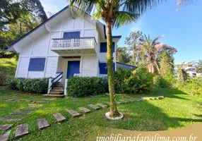 Foto 1 de Casa de Condomínio com 4 Quartos à venda, 174m² em Praia Santa Rita, Ubatuba