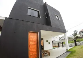 Foto 1 de Casa de Condomínio com 4 Quartos à venda, 240m² em Canasvieiras, Florianópolis