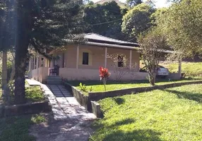 Foto 1 de Fazenda/Sítio com 4 Quartos à venda, 2000m² em Centro, Jaguaraçu