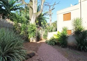 Foto 1 de Casa de Condomínio com 2 Quartos à venda, 76m² em Teresópolis, Porto Alegre