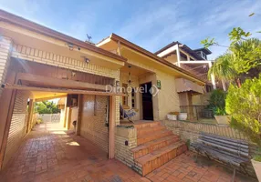 Foto 1 de Casa com 4 Quartos à venda, 228m² em Tristeza, Porto Alegre