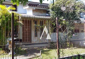 Foto 1 de Casa com 4 Quartos à venda, 220m² em Vila Nova, Porto Alegre