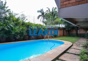 Foto 1 de Sobrado com 5 Quartos para venda ou aluguel, 680m² em Cidade Jardim, São Paulo