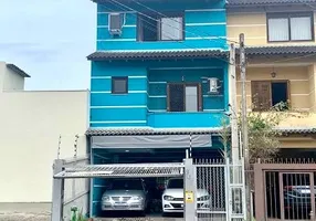 Foto 1 de Sobrado com 4 Quartos à venda, 189m² em Guarujá, Porto Alegre