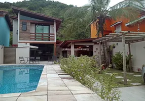 Foto 1 de Casa com 3 Quartos à venda, 158m² em Praia do Tombo, Guarujá