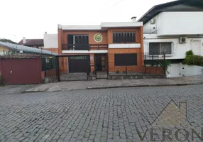 Foto 1 de Casa com 4 Quartos à venda, 273m² em Cinquentenário, Caxias do Sul