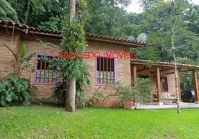 Foto 1 de Casa de Condomínio com 5 Quartos à venda, 208m² em Praia Domingas Dias, Ubatuba