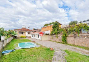 Foto 1 de Casa com 3 Quartos à venda, 124m² em Vila Nova, Porto Alegre