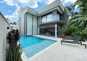 Foto 1 de Casa com 5 Quartos à venda, 377m² em Riviera de São Lourenço, Bertioga