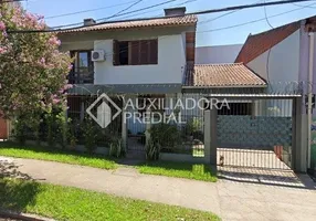 Foto 1 de Casa com 4 Quartos à venda, 200m² em Teresópolis, Porto Alegre