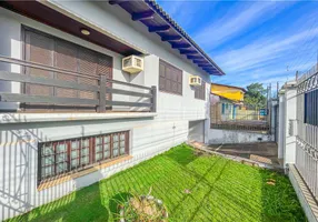 Foto 1 de Casa com 4 Quartos à venda, 280m² em Santa Fé, Porto Alegre