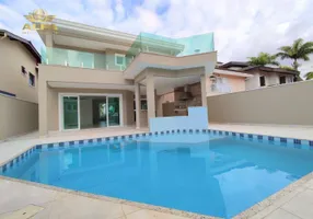 Foto 1 de Casa de Condomínio com 4 Quartos à venda, 240m² em Balneário Praia do Pernambuco, Guarujá