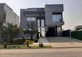 Foto 1 de Casa de Condomínio com 5 Quartos à venda, 515m² em Barra da Tijuca, Rio de Janeiro