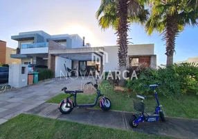 Foto 1 de Casa de Condomínio com 4 Quartos à venda, 185m² em Santa Luzia, Capão da Canoa