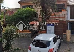 Foto 1 de Casa com 5 Quartos à venda, 200m² em Petrópolis, Porto Alegre