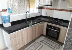 Foto 1 de Casa de Condomínio com 2 Quartos à venda, 49m² em Mirim, Praia Grande