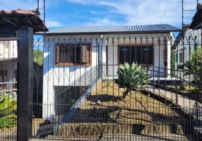 Foto 1 de Casa com 4 Quartos à venda, 160m² em Vila Nova, Porto Alegre