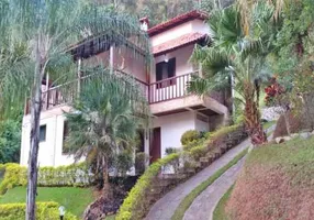 Foto 1 de Casa de Condomínio com 4 Quartos à venda, 385m² em Canto das Águas, Rio Acima