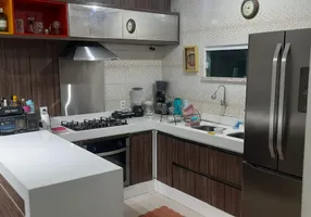 Foto 1 de Sobrado com 4 Quartos à venda, 240m² em Maraponga, Fortaleza