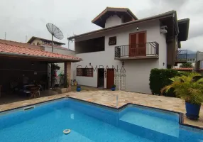 Foto 1 de Casa com 4 Quartos à venda, 290m² em Indaiá, Caraguatatuba
