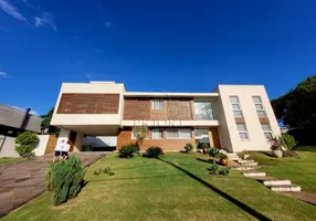 Foto 1 de Casa de Condomínio com 4 Quartos para venda ou aluguel, 309m² em Vila Nova, Porto Alegre