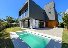 Foto 1 de Casa com 4 Quartos à venda, 240m² em Condominio Porto Coronado, Xangri-lá