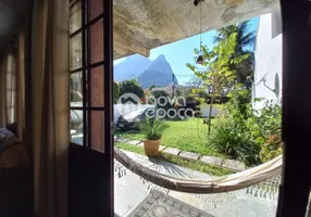 Foto 1 de Casa com 4 Quartos à venda, 280m² em Barra da Tijuca, Rio de Janeiro