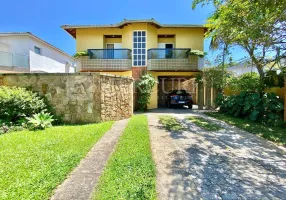 Foto 1 de Casa de Condomínio com 4 Quartos à venda, 202m² em Balneário Praia do Pernambuco, Guarujá