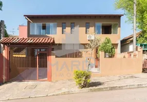 Foto 1 de Casa com 4 Quartos à venda, 250m² em Cavalhada, Porto Alegre