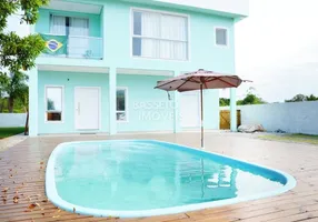 Foto 1 de Casa de Condomínio com 5 Quartos à venda, 220m² em Canasvieiras, Florianópolis