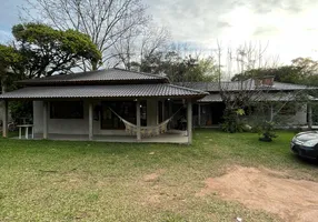 Foto 1 de Fazenda/Sítio com 6 Quartos à venda, 400m² em Guaíba Country Club, Eldorado do Sul